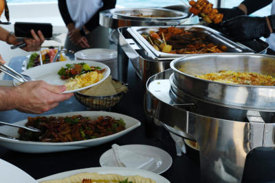 People enjoying the buffet on the cruise